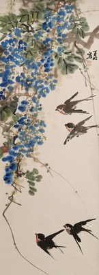 紫藤花开迎归燕